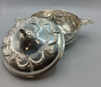 Circular silver vegetable dish in the Louis...