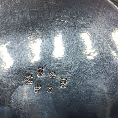 Circular silver vegetable dish in the Louis...