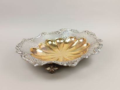 Oval-shaped silver basket with contours....
