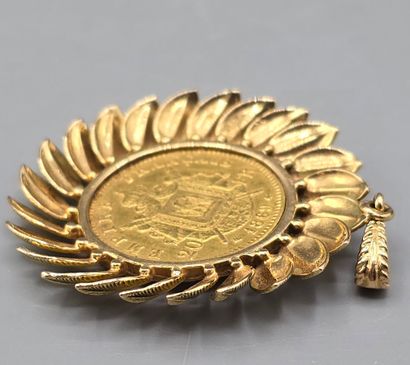 Pièce de 20 francs montée en pendentif.
Pièce...
