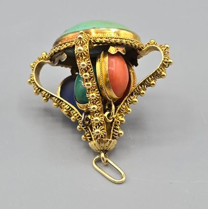 Pendentif breloque en or jaune 750°°.
Il...