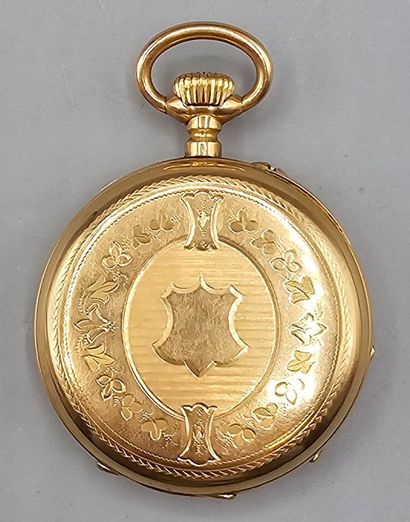 Montre de poche circulaire en or jaune 750°°...