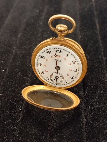 'TRIB'
Montre de col en or jaune 750°° (cuvette...
