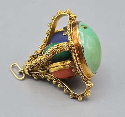 Pendentif breloque en or jaune 750°°.
Il...