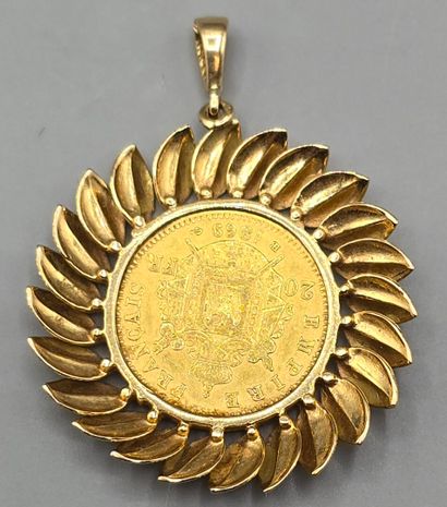 Pièce de 20 francs montée en pendentif.
Pièce...