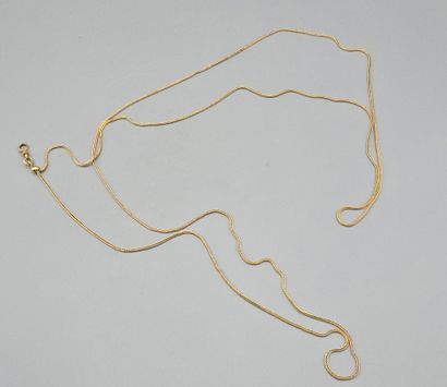 Chaine de montre en or jaune 750°°.
Maille...