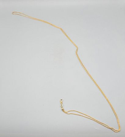 Chaine de montre en or jaune 750°°.
Maille...