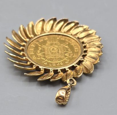 Pièce de 20 francs montée en pendentif.
Pièce...