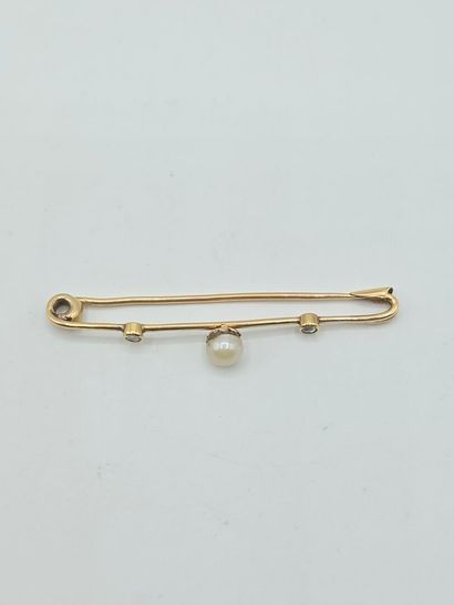 Broche-barrette en or jaune 750°° ornée d'une...