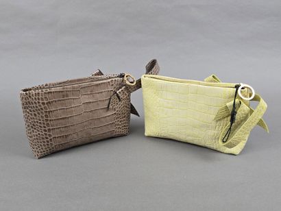 Paule KA
Deux pochettes en cuir imitant le...