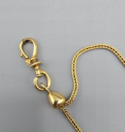 Chaine de montre en or jaune 750°°.
Maille...