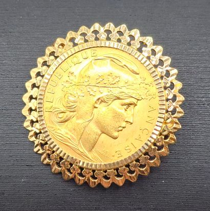 Pièce de 20 francs en or jaune montée en...