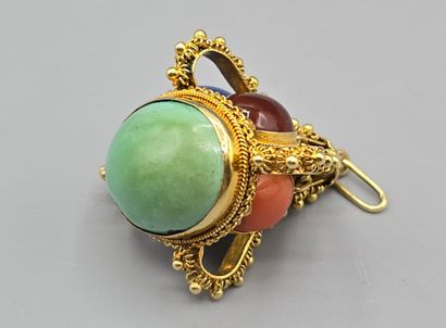 Pendentif breloque en or jaune 750°°.
Il...