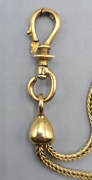 Chaine de montre en or jaune 750°°.
Maille...
