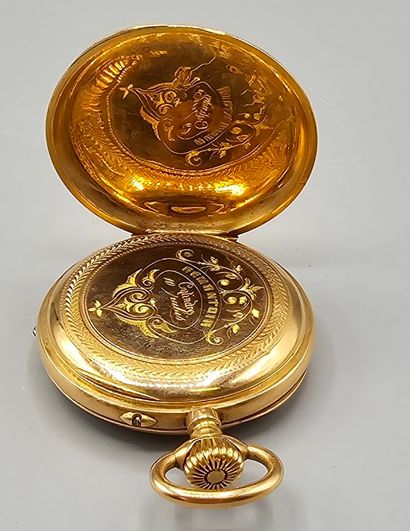 Montre de poche circulaire en or jaune 750°°...