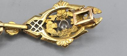 Bracelet articulé en or jaune 750°°.
Constitué...