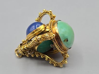 Pendentif breloque en or jaune 750°°.
Il...