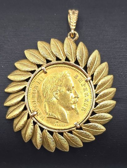 Pièce de 20 francs montée en pendentif.
Pièce...