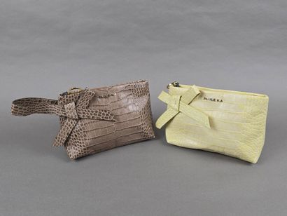 Paule KA
Deux pochettes en cuir imitant le...