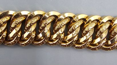 Bracelet en or jaune 750°° à mailles américaines....