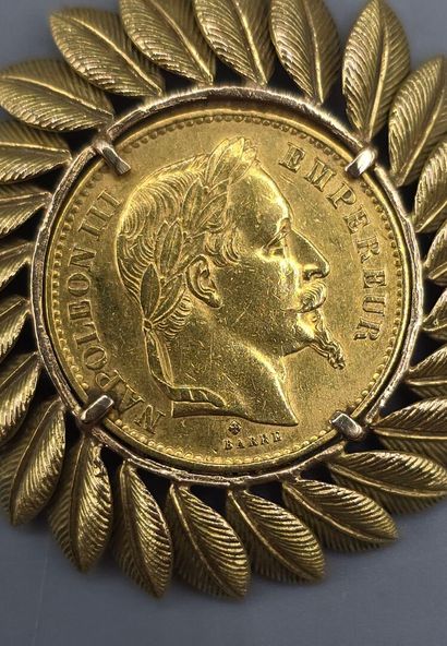 Pièce de 20 francs montée en pendentif.
Pièce...