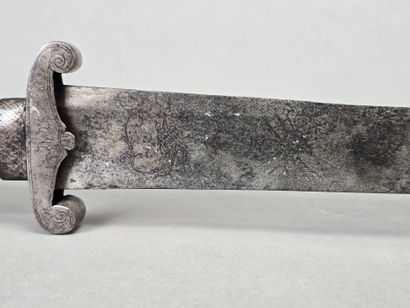 Dague ou épée de chasse/vénerie.
Lame courbée...
