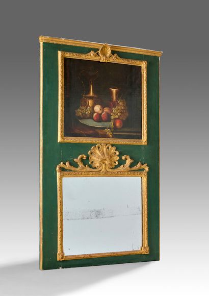 Trumeau de cheminée en bois doré et sculpté...