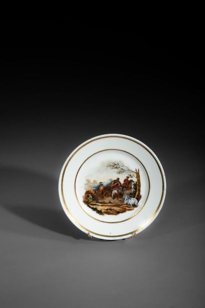 Assiette en porcelaine polychrome à décor...