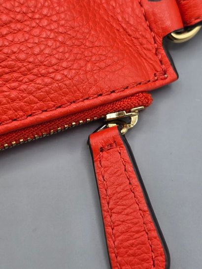 MICHAEL KORS.
Rectangular orange leather...