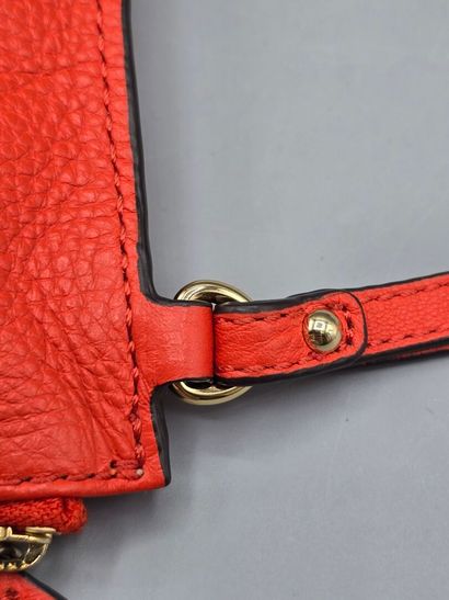 MICHAEL KORS.
Rectangular orange leather...