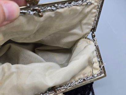 Evening clutch in silver-plated metal set...