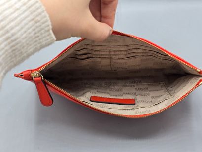 MICHAEL KORS.
Rectangular orange leather...