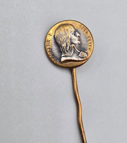 Set of three tie pins: 
- gilt metal tie...