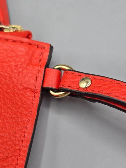 MICHAEL KORS.
Rectangular orange leather...