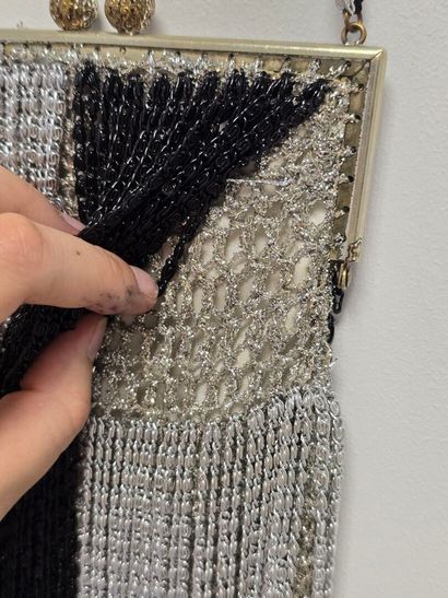 Evening clutch in silver-plated metal set...