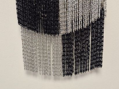 Evening clutch in silver-plated metal set...