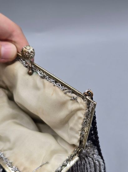 Evening clutch in silver-plated metal set...