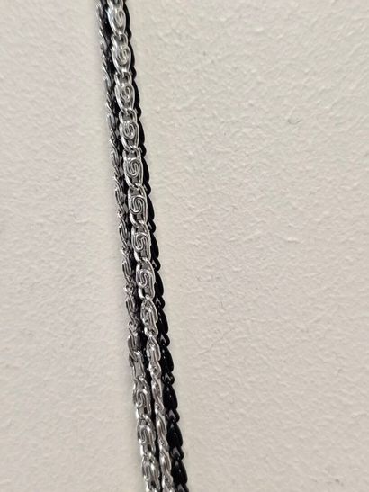 Evening clutch in silver-plated metal set...