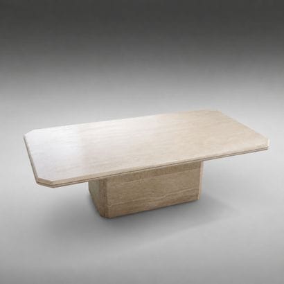 Travertine coffee table.
Faceted central...