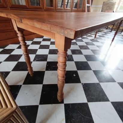 In the bookcase
Large rectangular table in...