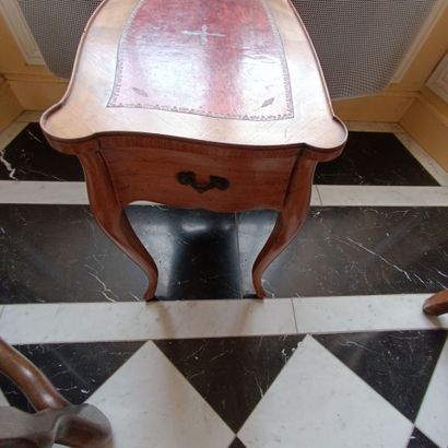 In the library
Small veneered coffee table.
Opens...