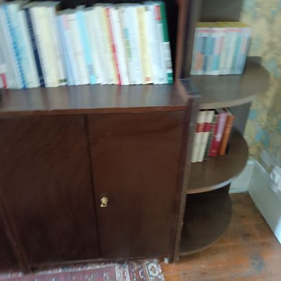 In the library / in the boudoir
Three bookcase...
