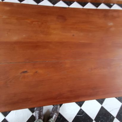 In the bookcase
Large rectangular table in...