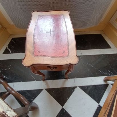 In the library
Small veneered coffee table.
Opens...