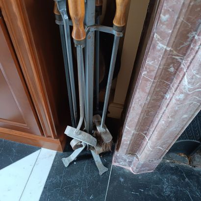 In the library
A metal fireplace set including...