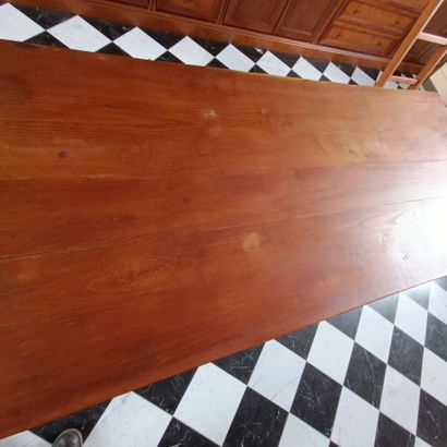 In the bookcase
Large rectangular table in...
