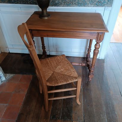 In Monsieur's bedroom
Walnut writing table...