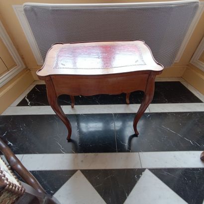 In the library
Small veneered coffee table.
Opens...