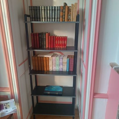 In the pink and white living room
Bookcase...