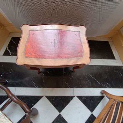 In the library
Small veneered coffee table.
Opens...